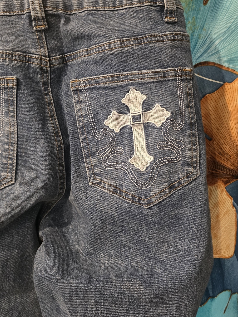 Hot Topic Blue Wide-Leg Jeans with White Cross Patch